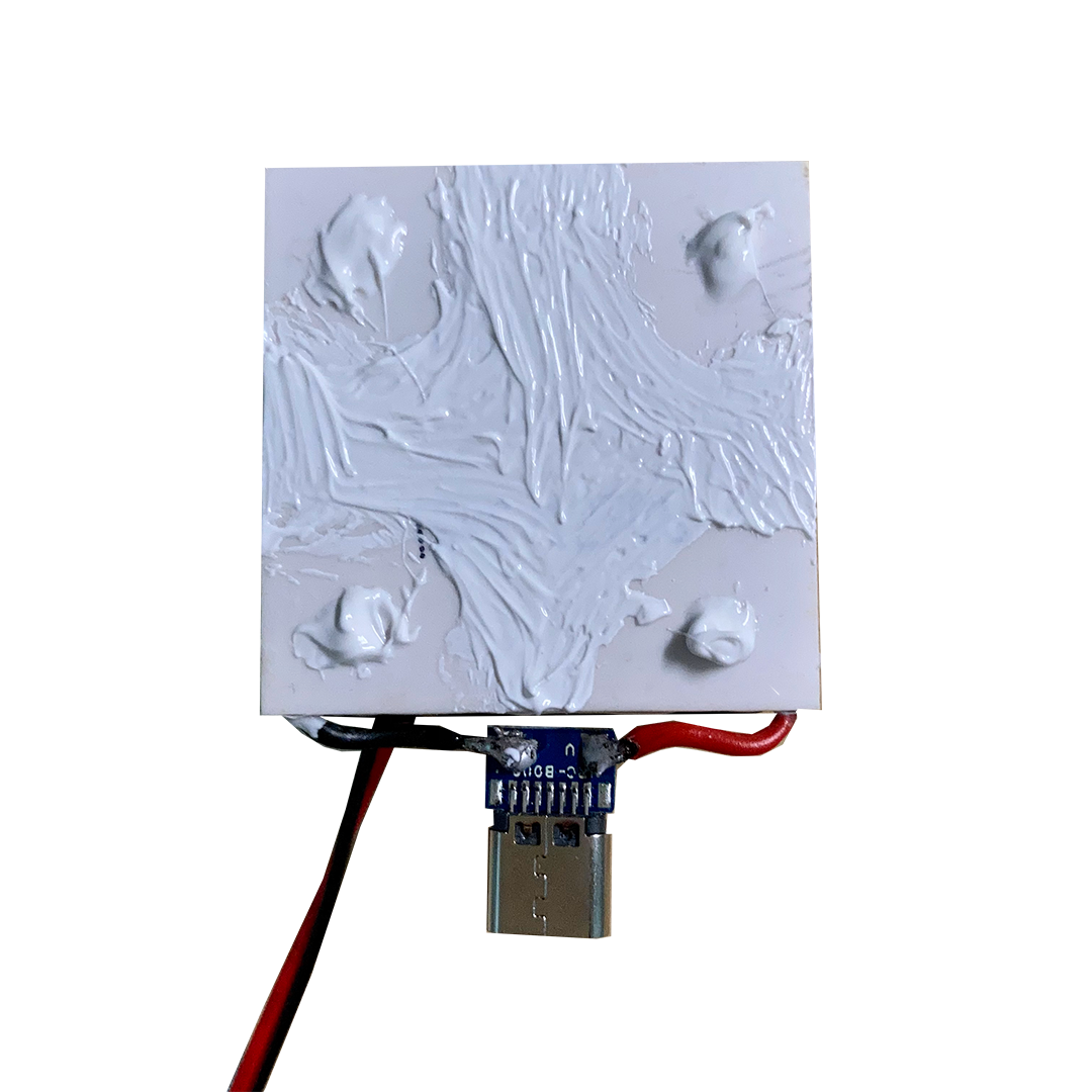 Fan, Peltier module, and copper plate bonded together