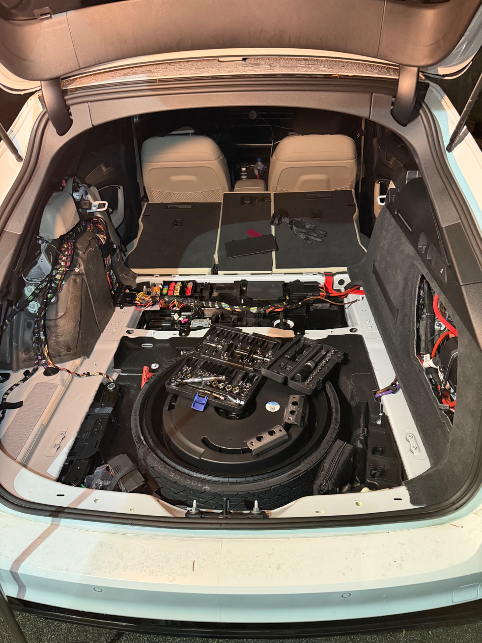 A6 Allroad cargo area stripped for wiring access