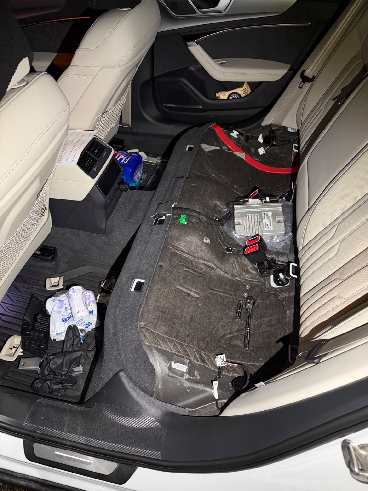 Rear seat removed from the Audi A6 Allroad during the TPMS retrofit