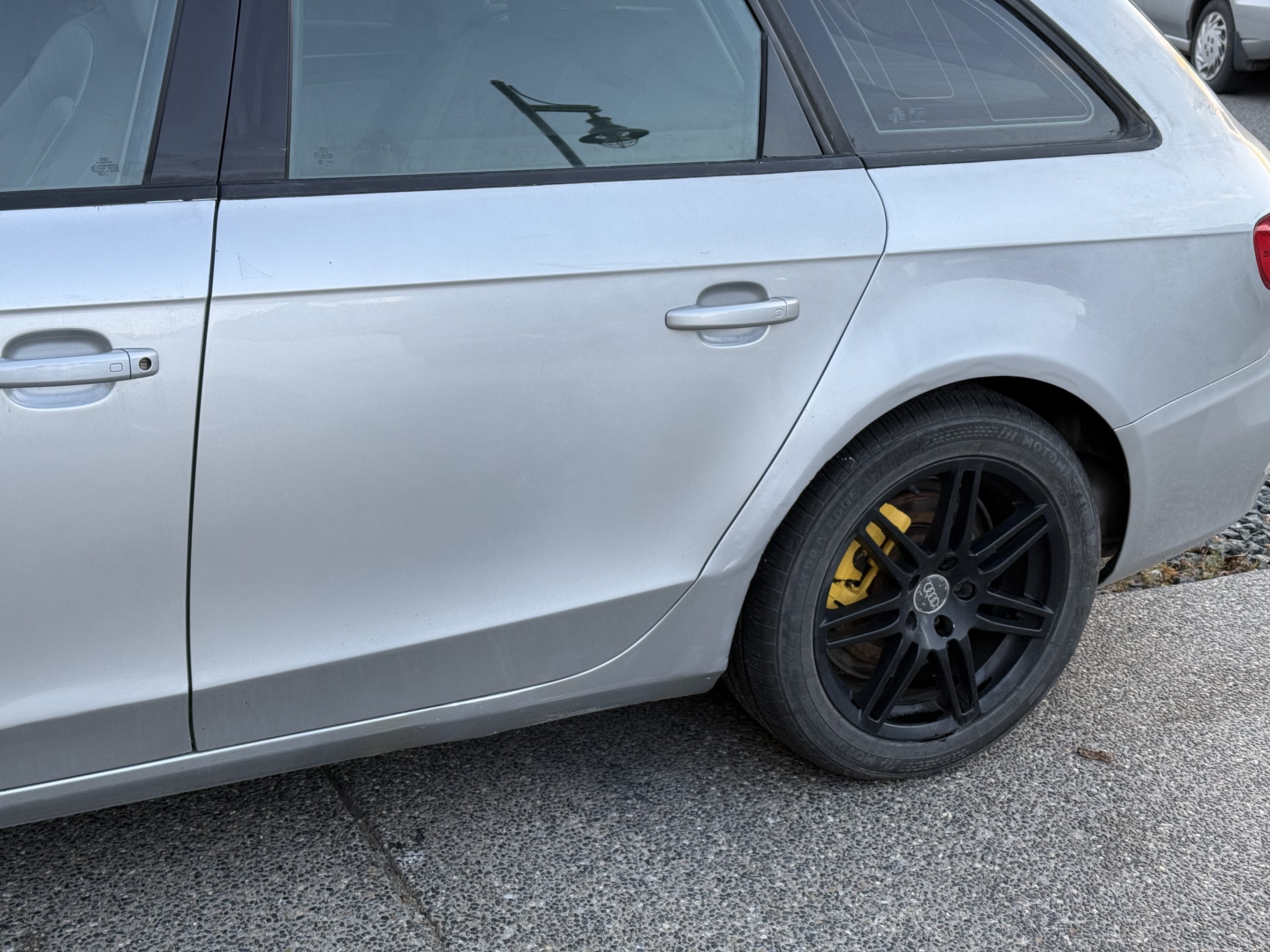 Side and rear wheel arch after the repair