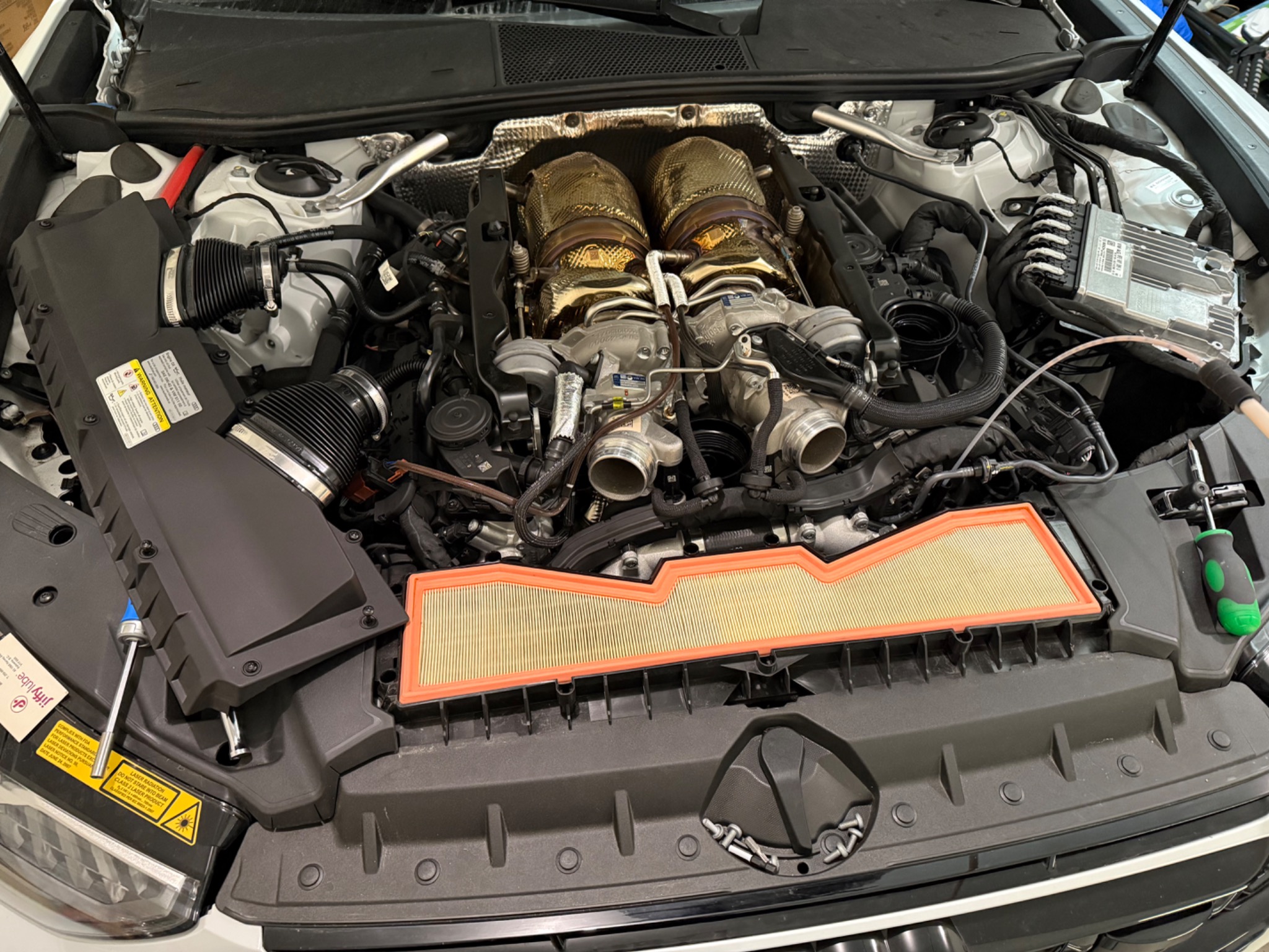 RS6 engine bay with the air filter element resting across the front